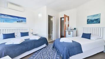 Comfort Triple Room | Premium bedding, minibar, in-room safe, laptop workspace