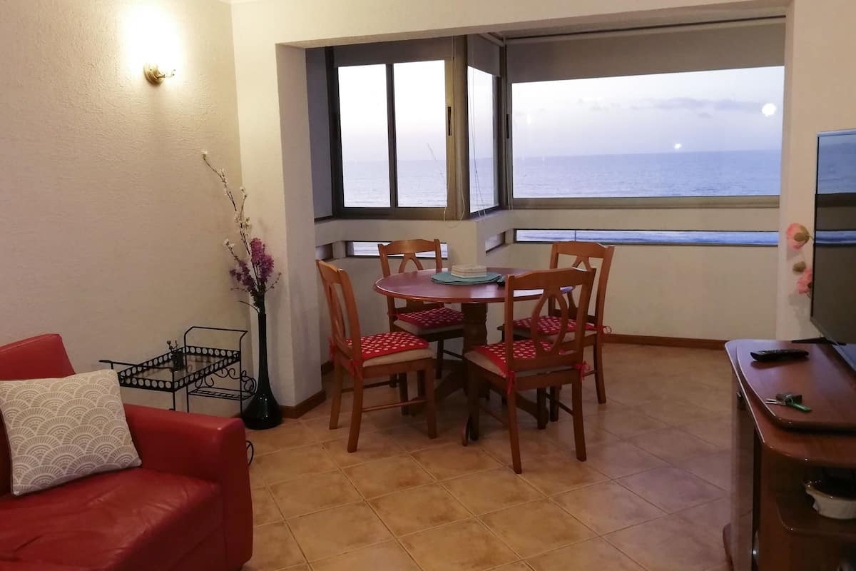 Family Apartment, 2 Bedrooms, Smoking, Sea View | Living room | 40-inch LED TV with cable channels, TV