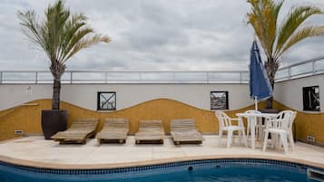 Outdoor pool, pool umbrellas, pool loungers