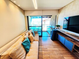 Comfort Apartment | Living area | Flat-screen TV