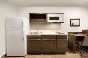 Full-size fridge, microwave, stovetop
