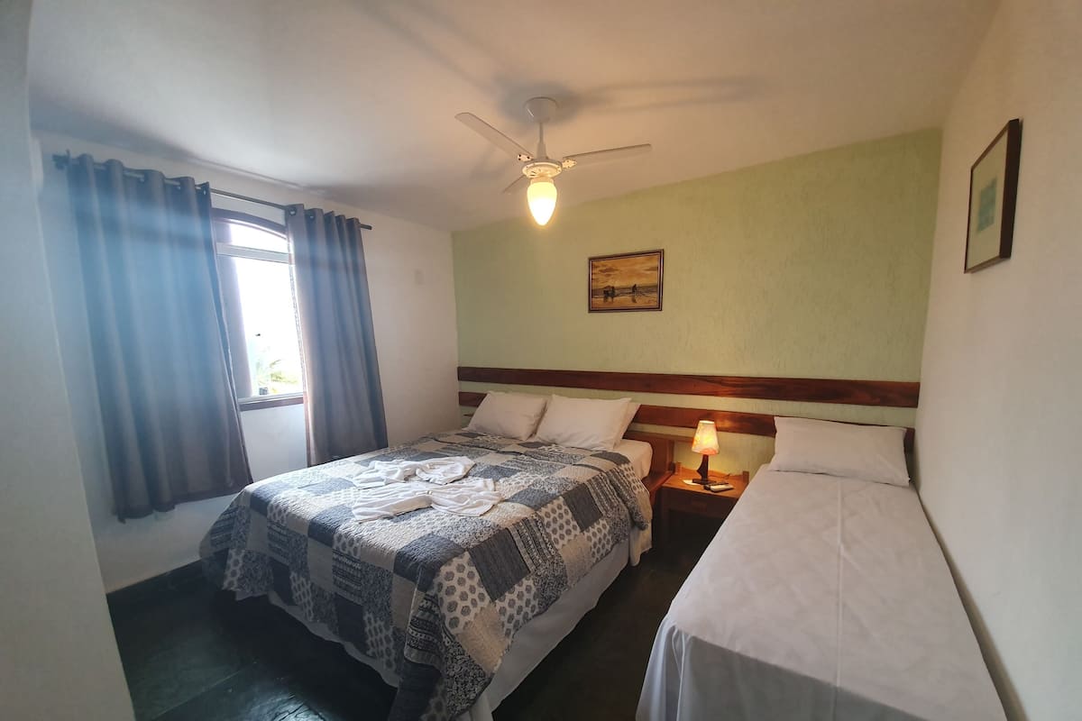 Comfort Room, Private Bathroom | Minibar, blackout drapes, free WiFi, bed sheets