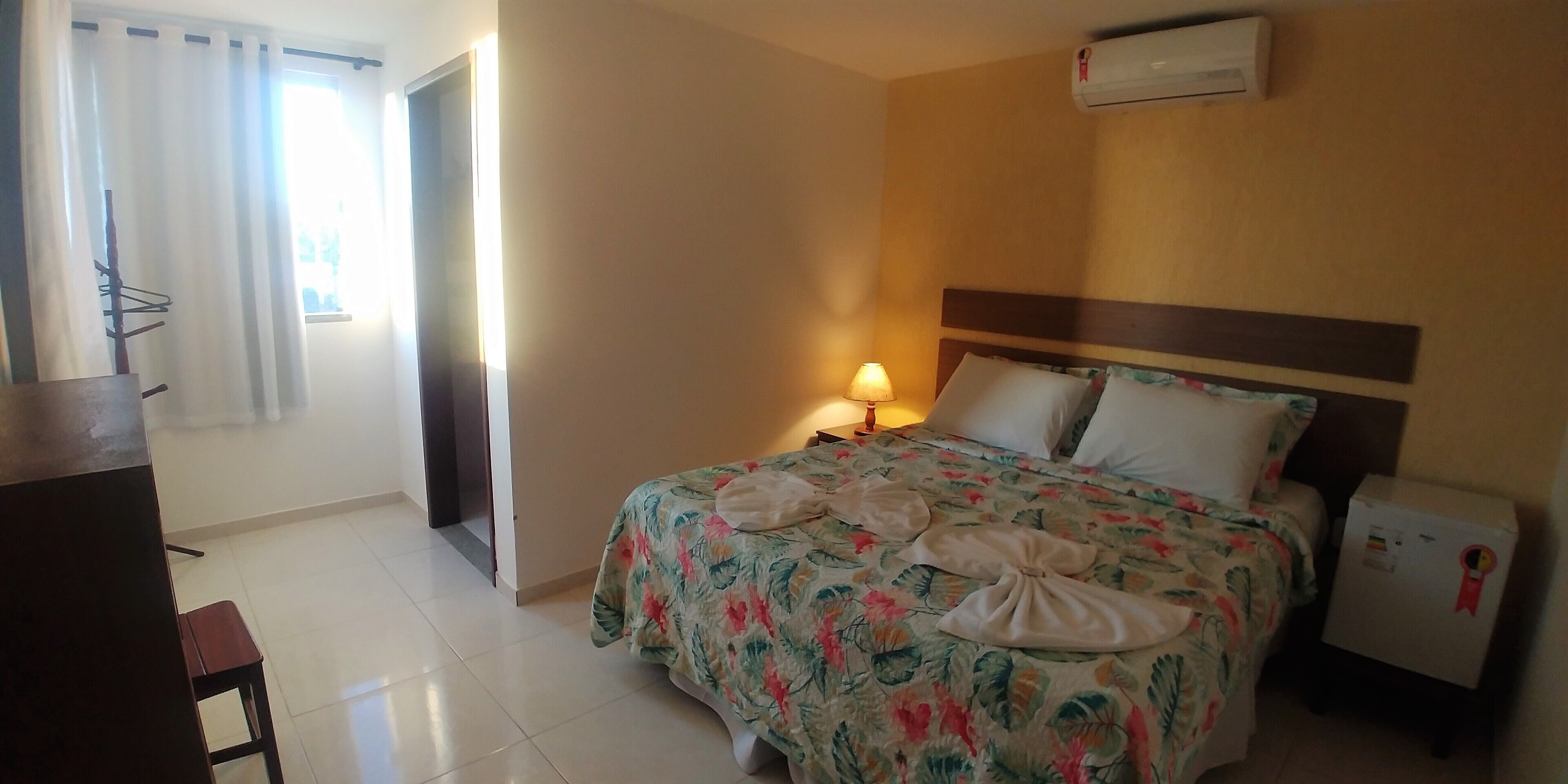 Comfort Room, Private Bathroom | Minibar, blackout drapes, free WiFi, bed sheets