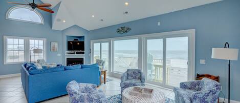 Flat-screen TV, fireplace, DVD player, stereo