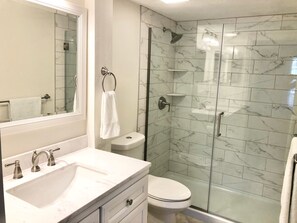 Combined shower/tub, hair dryer, towels, toilet paper