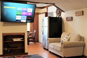 Smart TV, DVD player, table football, books