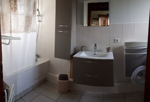 Bathtub, hair dryer