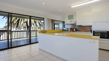 Microwave, dishwasher, dining tables