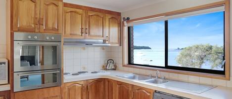 Microwave, dishwasher, dining tables