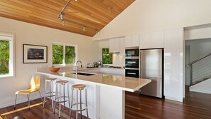 Microwave, dishwasher, dining tables