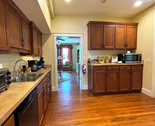 Enjoy cooking in this well-equipped kitchen with a microwave and coffee maker.