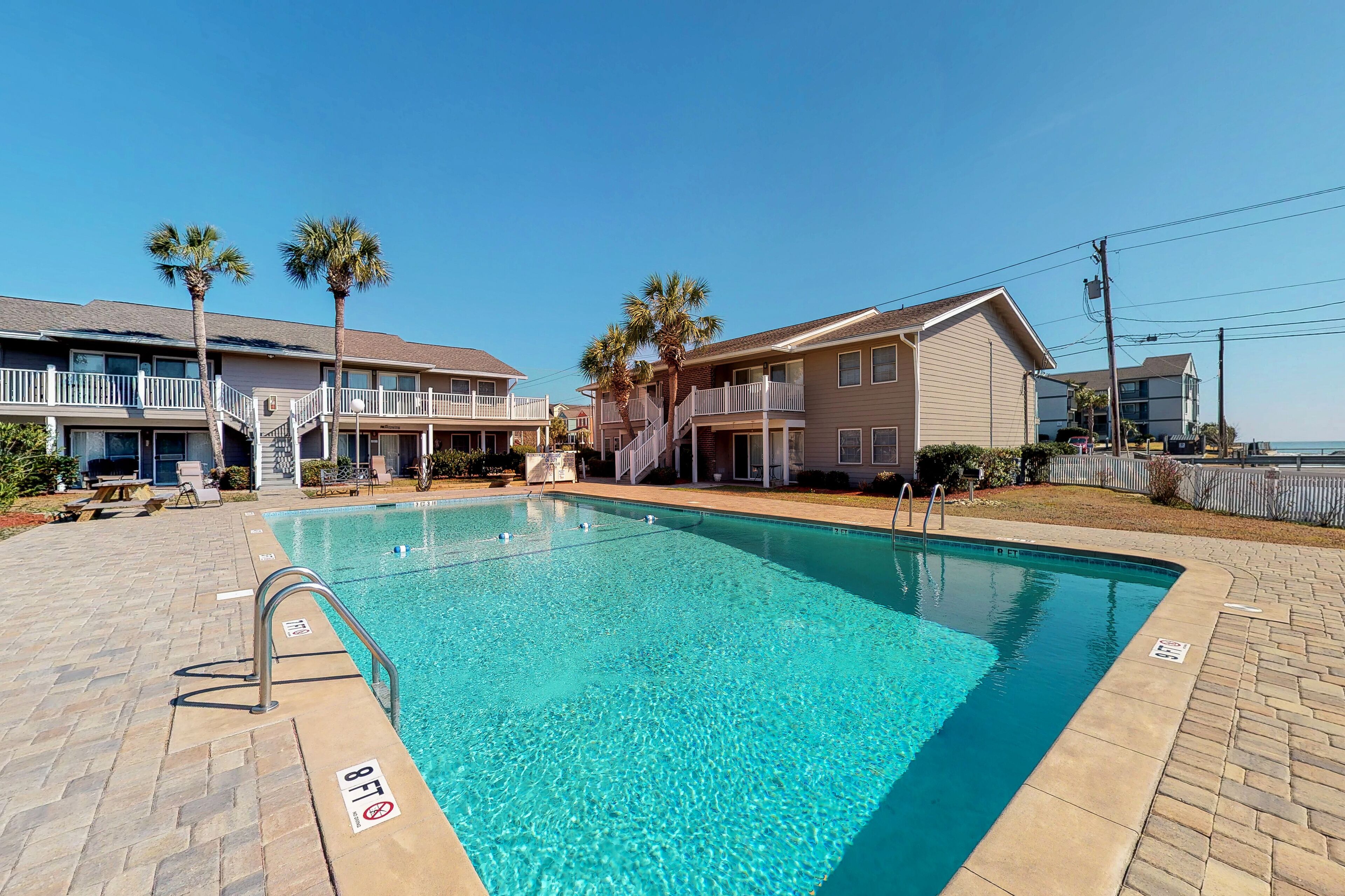 Ocean view condo w/ shared pool & large balcony - steps to the beach!