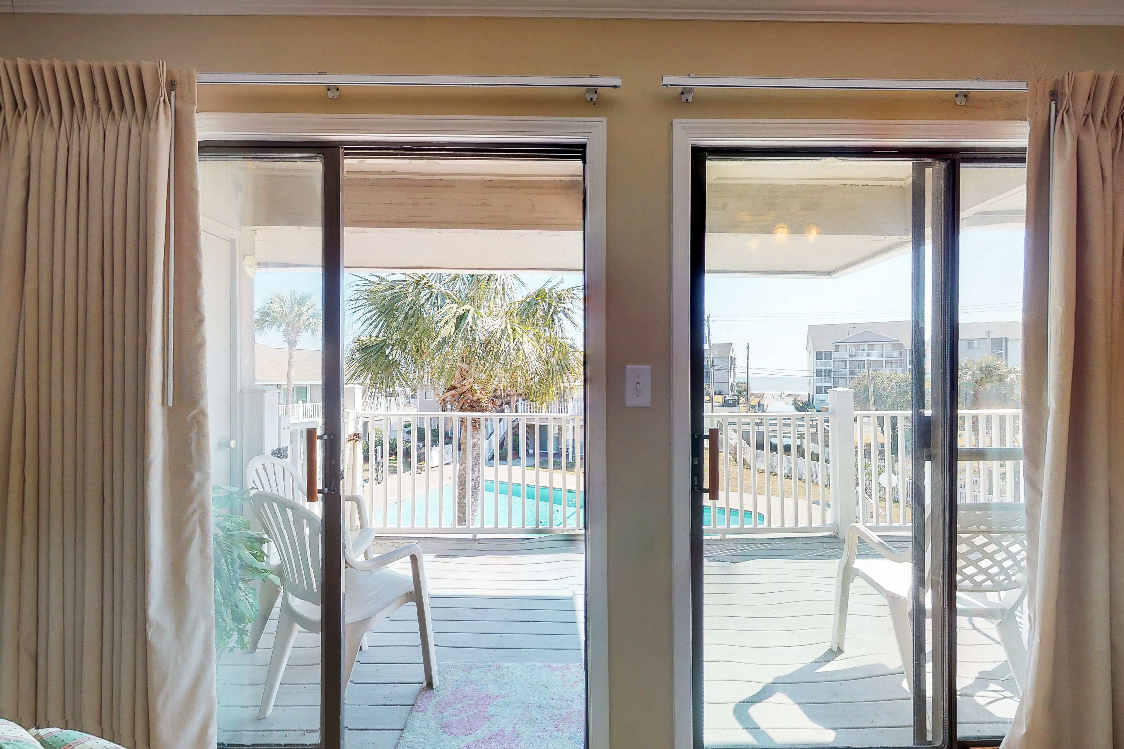 Ocean view condo w/ shared pool & large balcony - steps to the beach!