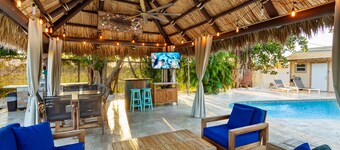 Tiki Paradise Oasis
Home + Pool, Tiki Hut & 10 Min to Beach! New Outdoor Kitchen