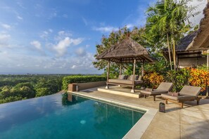 A lap pool, sun loungers