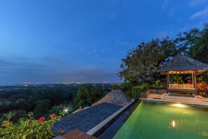 A lap pool, sun loungers