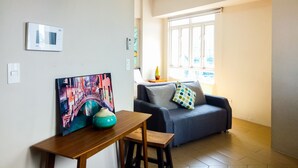 Amusing Suite | Living area - Airport T3 Newport Condotel (Pasay)