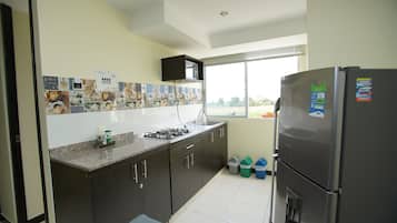 Basic Apartment, 2 Bedrooms, Non Smoking | Private kitchen | Full-sized fridge, microwave, stovetop, coffee/tea maker