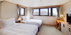 Premium bedding, down duvets, memory-foam beds, in-room safe