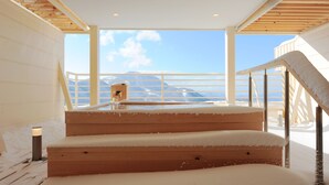 A wooden staircase with snow on the steps leading to a balcony with a view of mountains. - T Hotel Ryuoo (Yamanouchi)