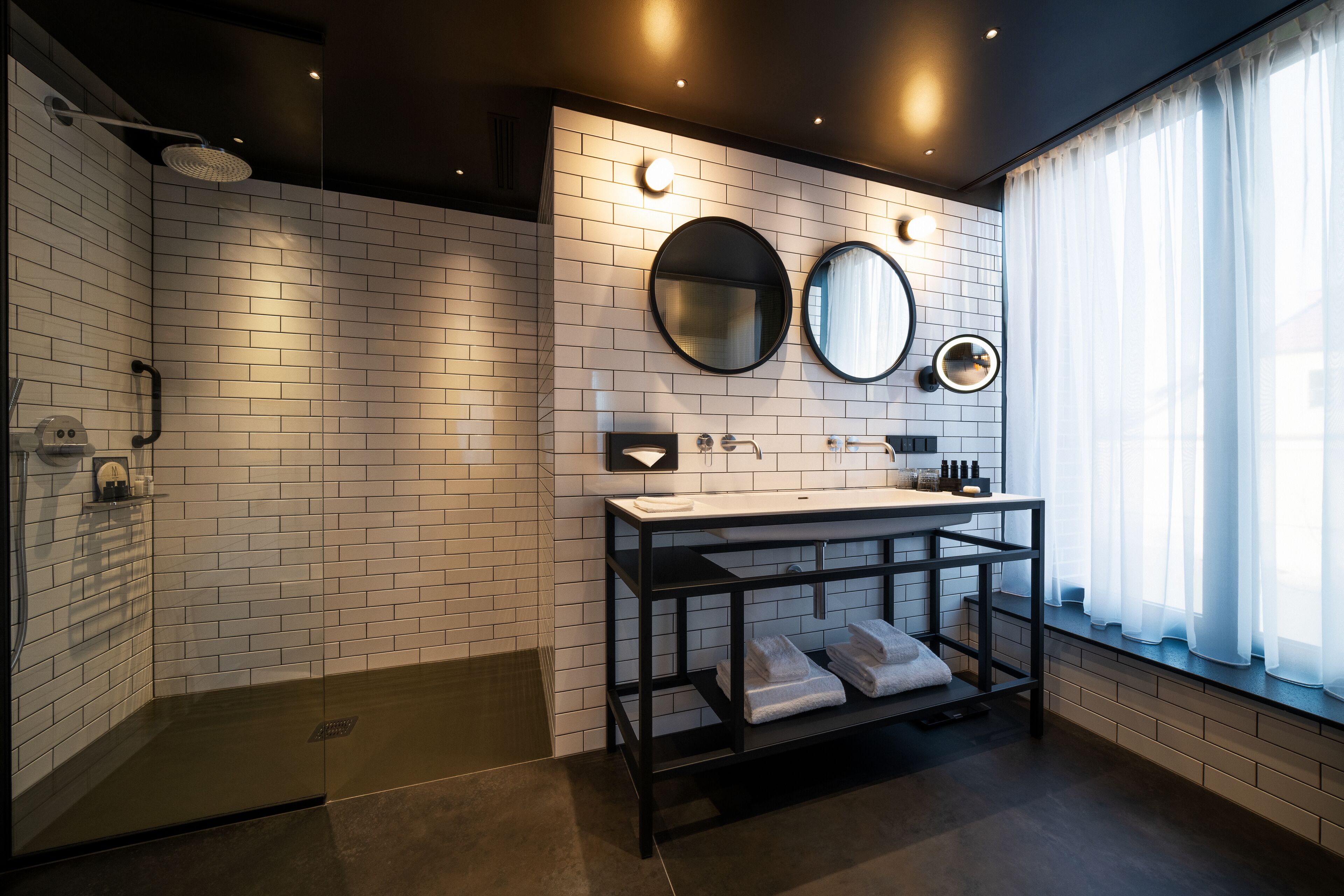 junior suite, 1 king bed | bathroom | eco-friendly toiletries, hair dryer, bathrobes, slippers