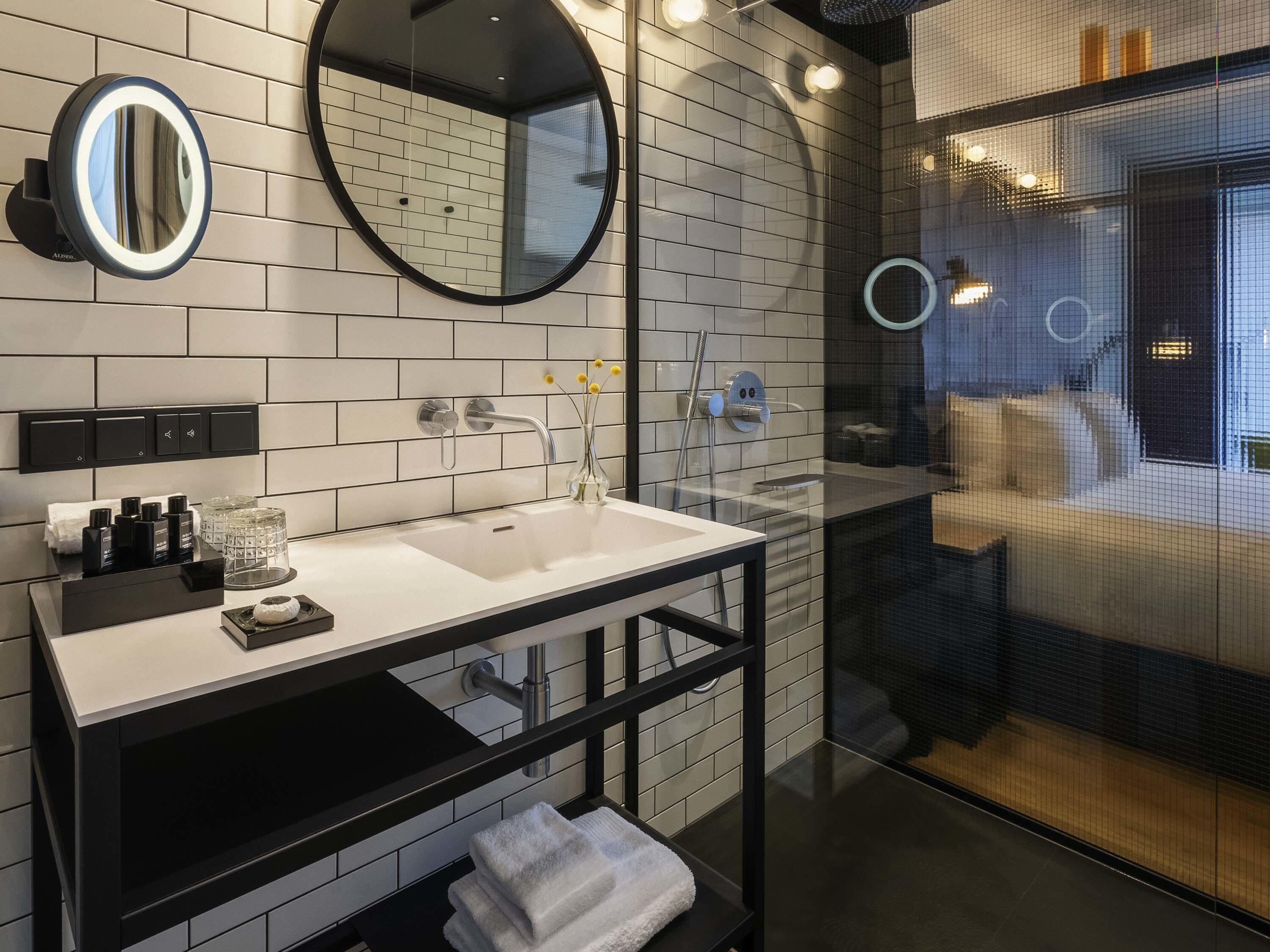 Eco-friendly toiletries, hair dryer, bathrobes, slippers