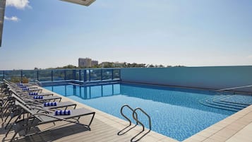 2 outdoor pools, open 8:00 AM to 8:00 PM, free pool cabanas