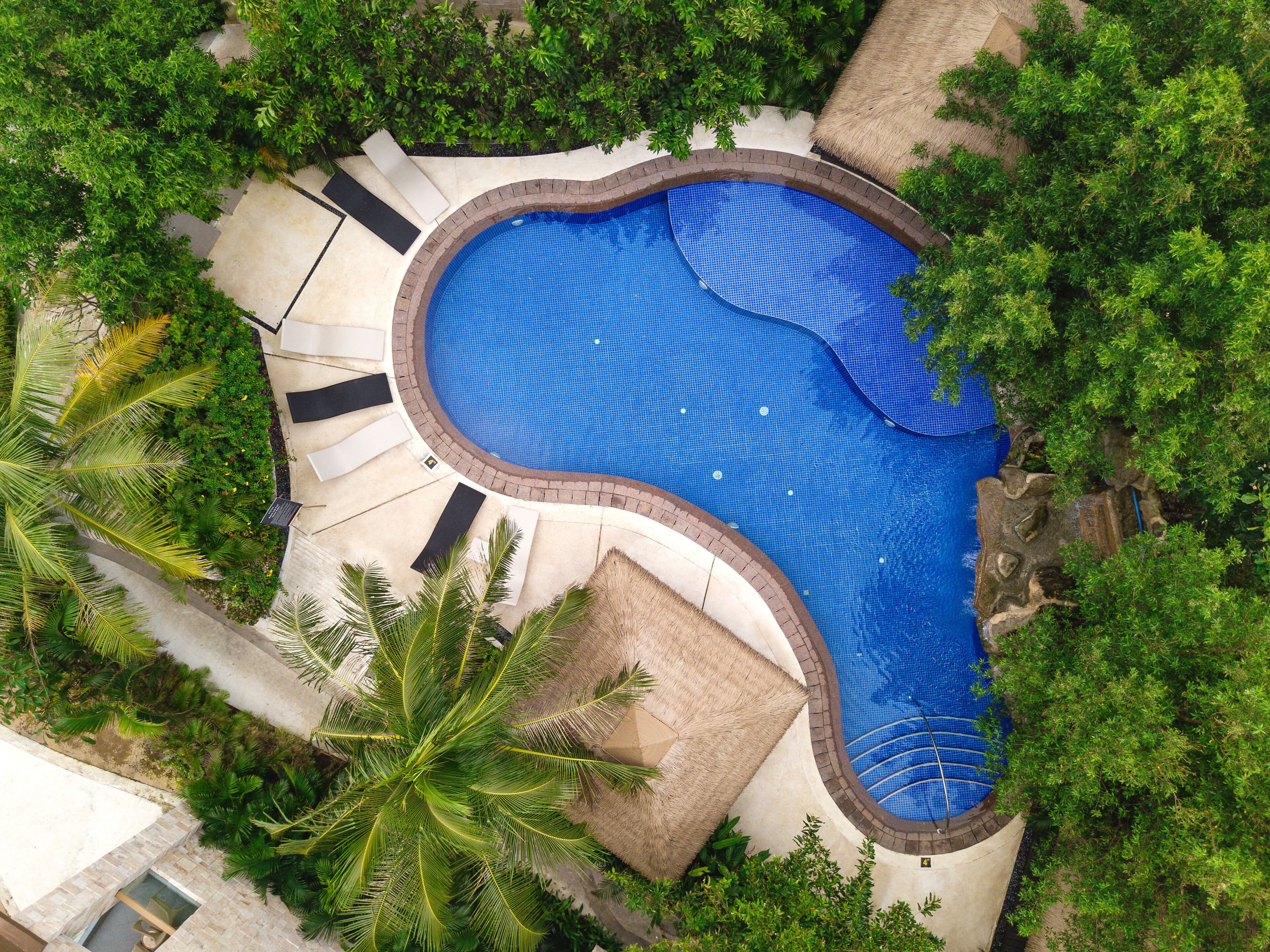 2 outdoor pools, open 8:00 AM to 8:00 PM, free pool cabanas