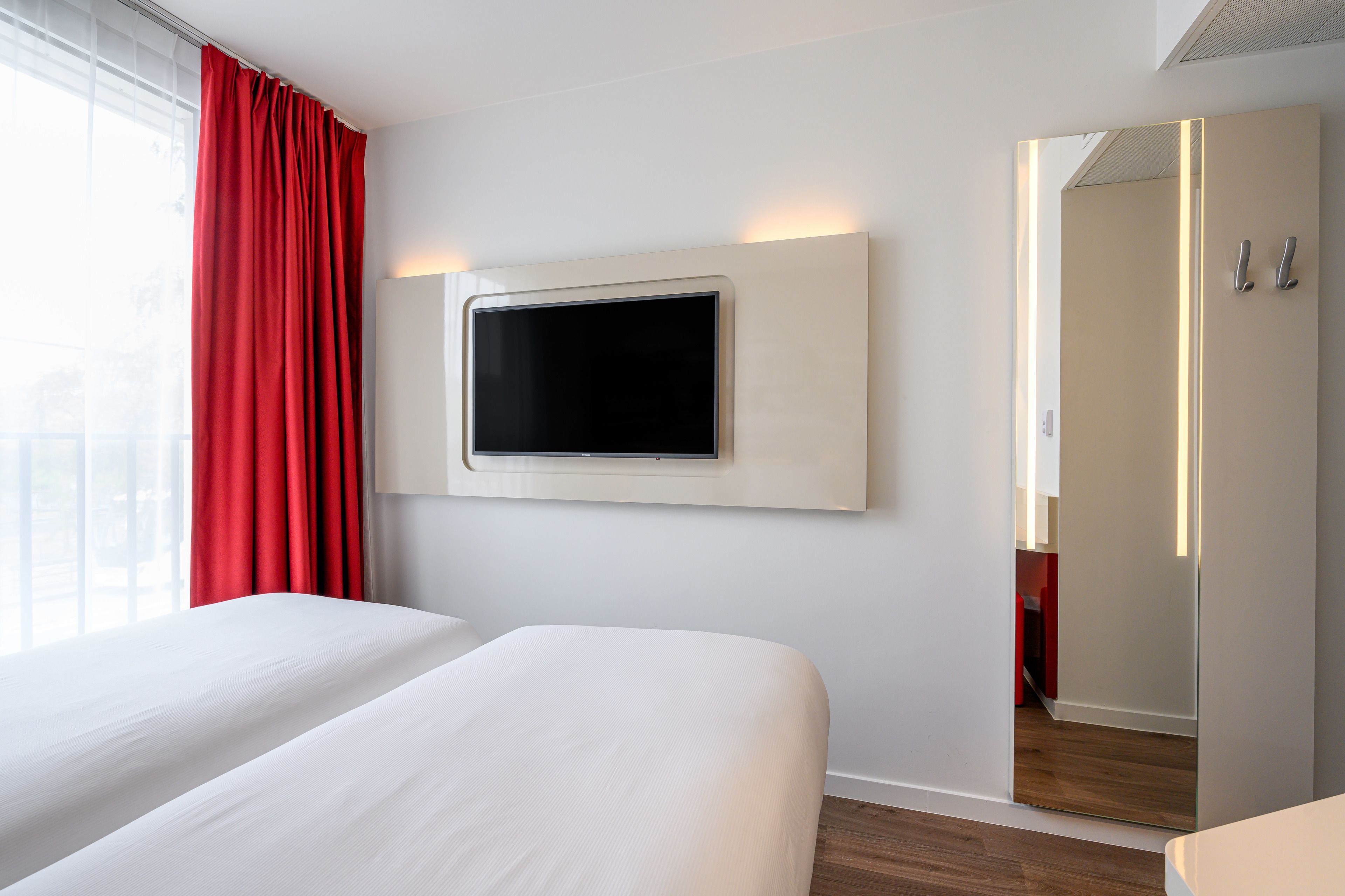 individually decorated, desk, laptop workspace, blackout curtains