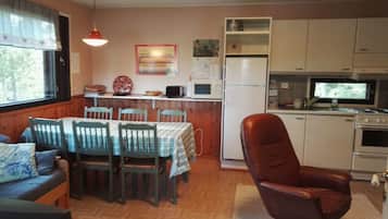 Basic Villa, Bay View | Living area | TV, fireplace