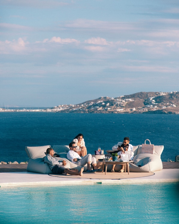 Breakfast, lunch served; local and international cuisine, pool views