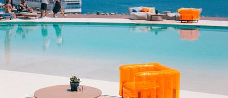 Breakfast, lunch served; local and international cuisine, pool views