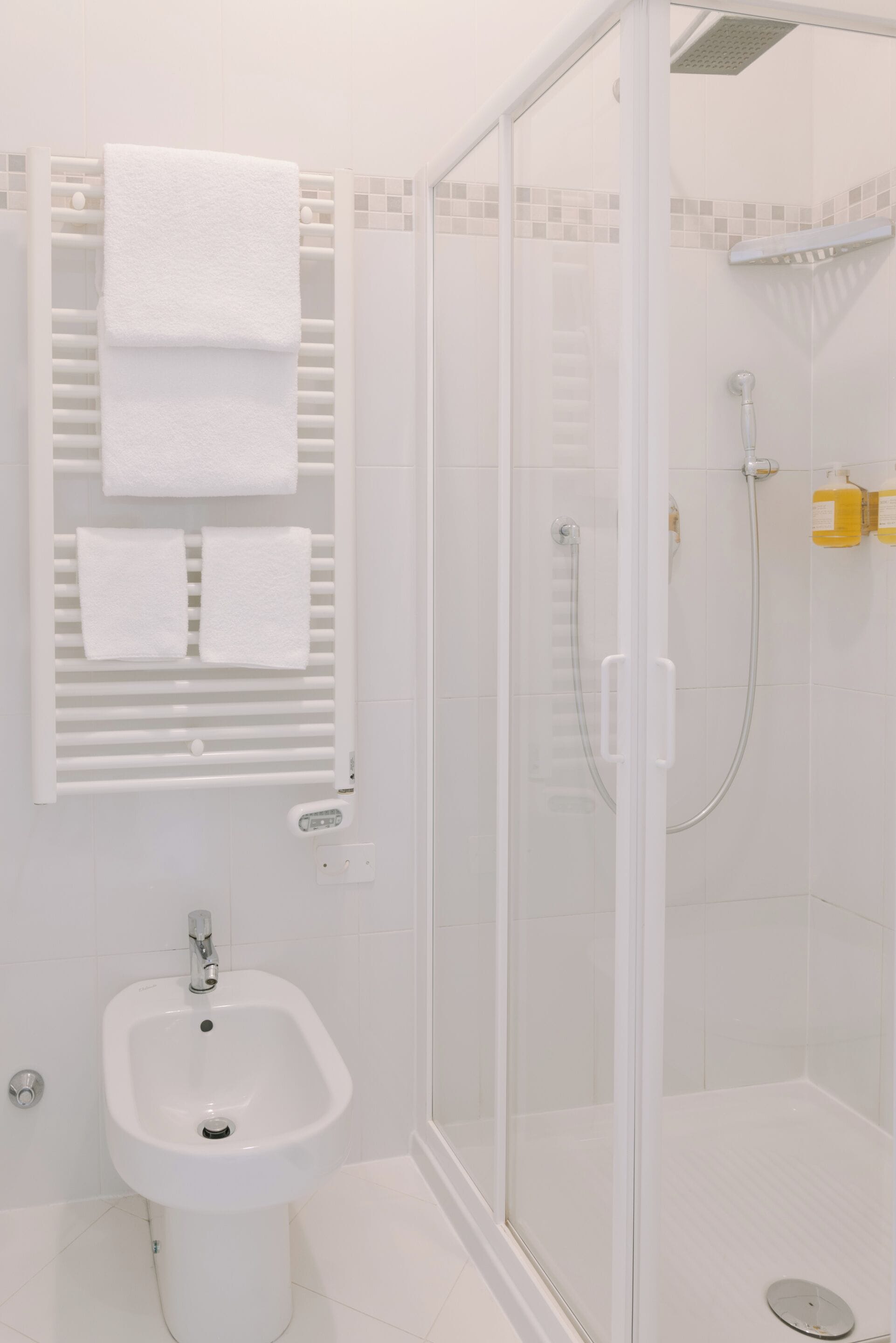 superior triple room | bathroom | shower, free toiletries, hair dryer, towels