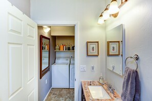 Combined shower/tub, hair dryer, towels, soap