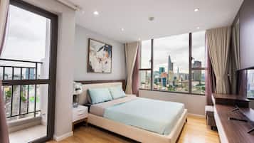 Apartamento, 3 habitaciones | Escritorio, cortinas opacas, tabla de planchar con plancha y wifi gratis