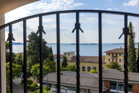 Romantic Room, 1 Bedroom, Partial Lake View (Mansard) | Minibar, in-room safe, desk, blackout drapes