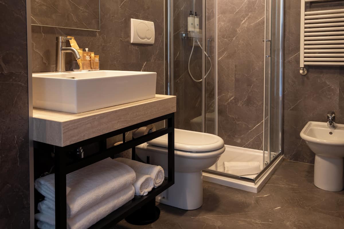 romantic room, 1 bedroom, partial lake view (mansard) | bathroom | jetted bath, hydromassage showerhead, free toiletries, hair dryer