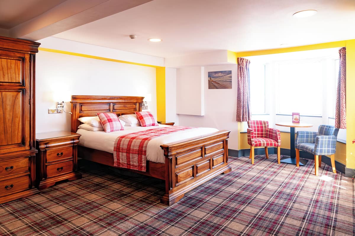 Exclusive Double Room | Desk, laptop workspace, blackout drapes, free WiFi