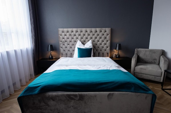 Blackout drapes, soundproofing, iron/ironing board, free WiFi