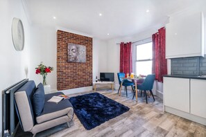Luxury Apartment | Living area | TV