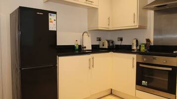 Luxury 2-Bedroom Apartment | Private kitchen | Fridge, microwave, oven, stovetop