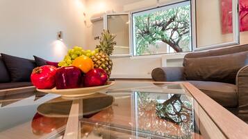 Villa | Living area | Flat-screen TV, DVD player