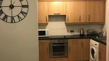 Luxury Apartment | Private kitchen | Fridge, microwave, oven, stovetop