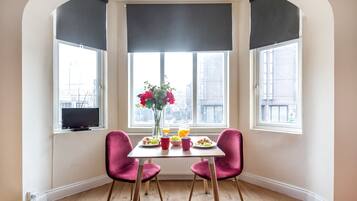 Studio Apartment | Private kitchen | Fridge, microwave, oven, stovetop
