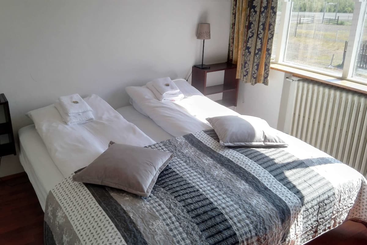 family quadruple room, private bathroom | blackout curtains, free cots/infant beds, free wifi, bed sheets