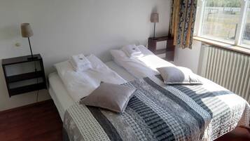 Family Quadruple Room, Private Bathroom | Blackout curtains, free cots/infant beds, free WiFi, bed sheets