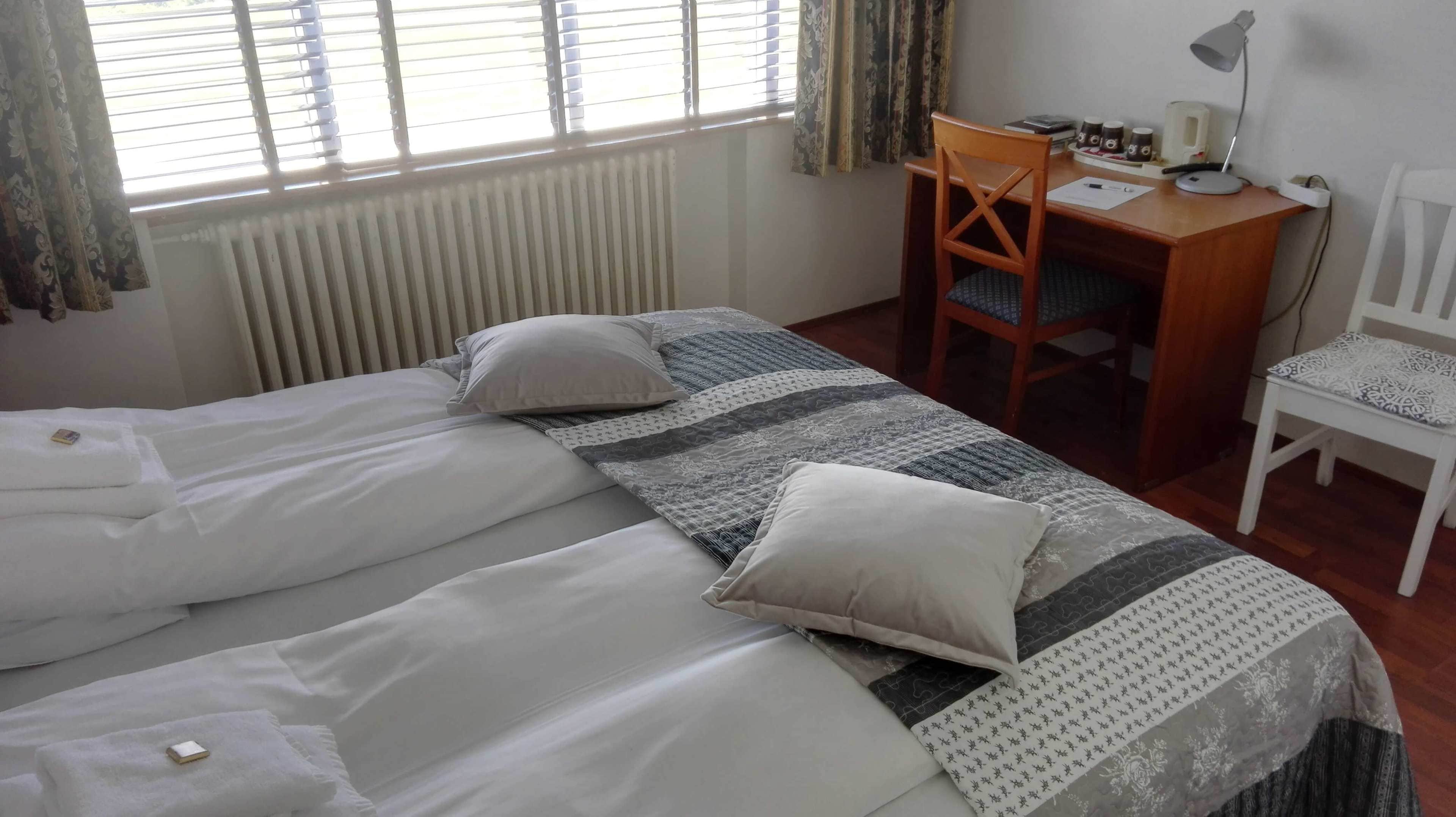 family quadruple room, private bathroom | blackout curtains, free cots/infant beds, free wifi, bed sheets