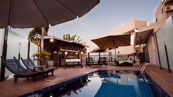 Outdoor pool, open 10:00 AM to 10:00 PM, sun loungers