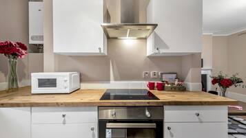 Luxury Apartment | Private kitchen | Fridge, microwave, oven, stovetop