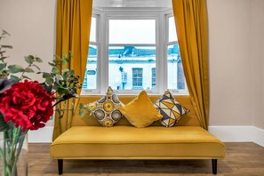 Luxury Apartment | Living area | Flat-screen TV